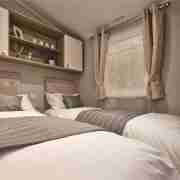 twin bedroom - single beds - headboards - bedside cabinet