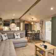 view from lounge to entrance door and storage cupboard