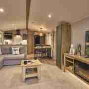 view from lounge to kitchen and dining